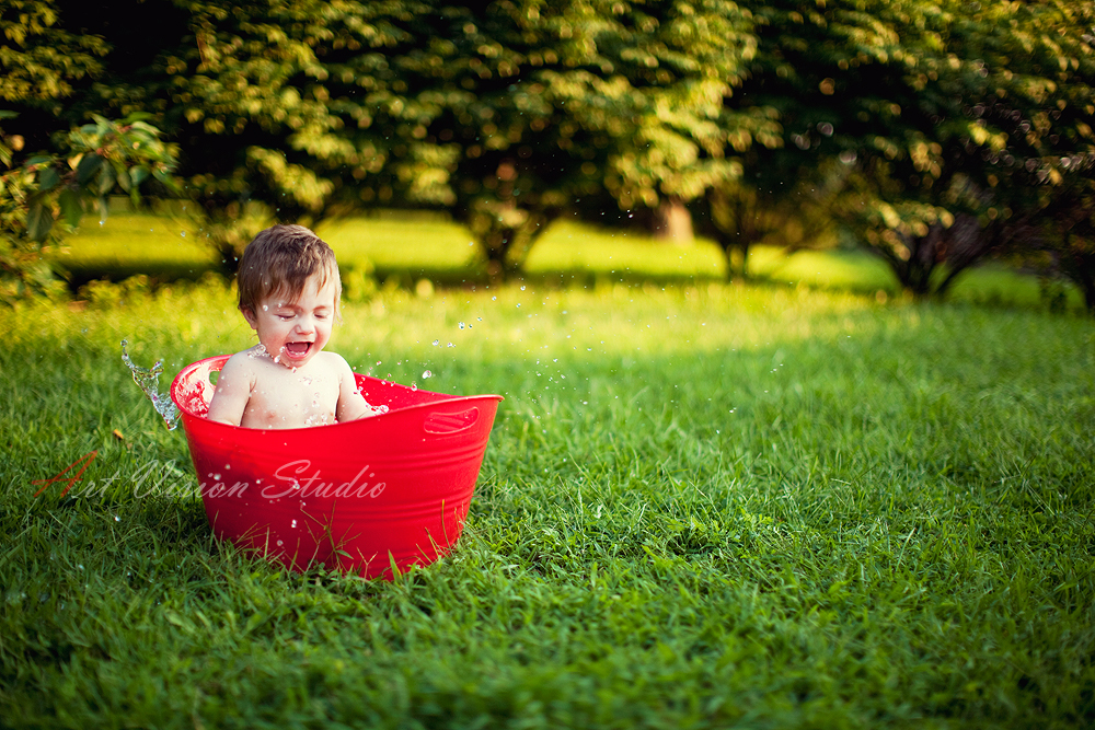  Infant photographer in CT -  Baby having fun in a bath tub