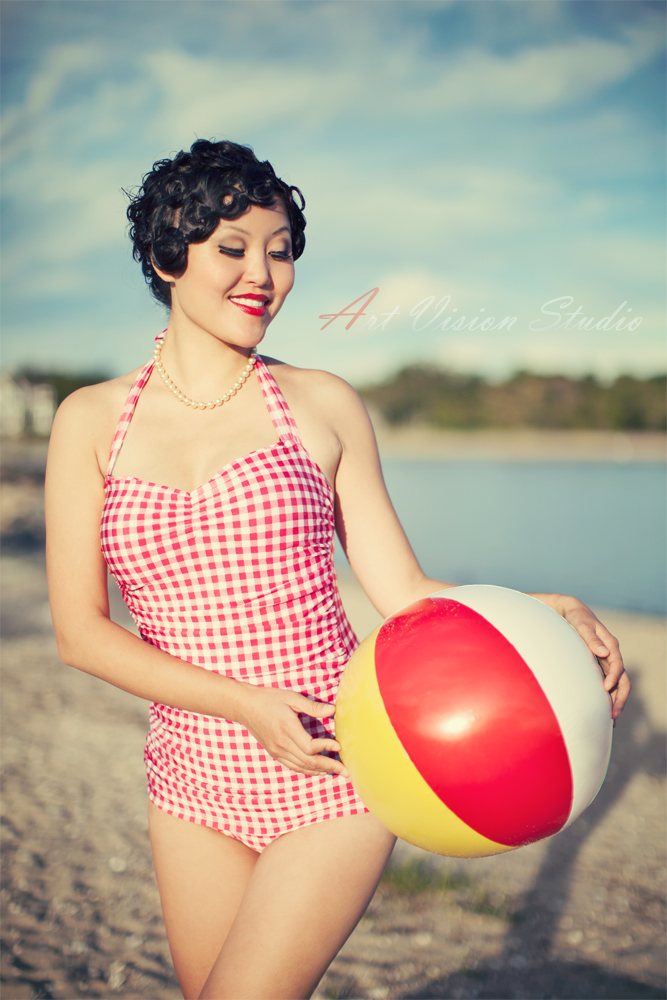 Vintage swimwear postcard photography - Vintage styled model holding a beach ball