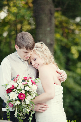 Bride and Groom posing for pictures- natural light wedding photographer in CT 