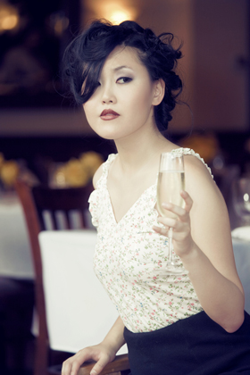   Jing with  the glass of Champaigne -Editorial photographer in Stamford