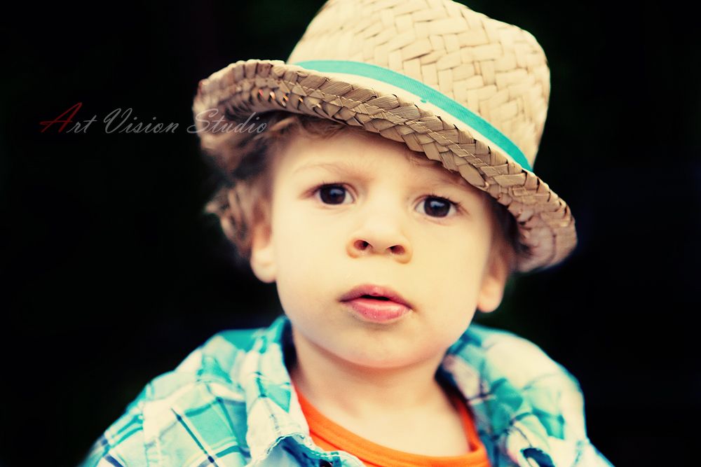 Family photographer in Greenwich, CT - Portrait of a boy in a hat
