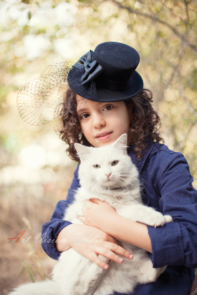 Stamford, CT children photographer - A girl posing with a cat