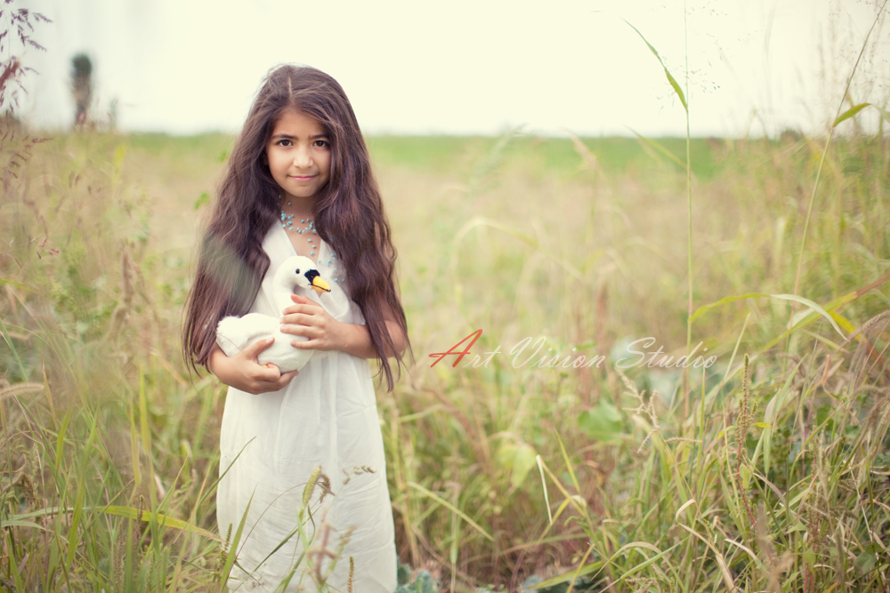  Children's photography session in Stamford, CT - A girl with a swan